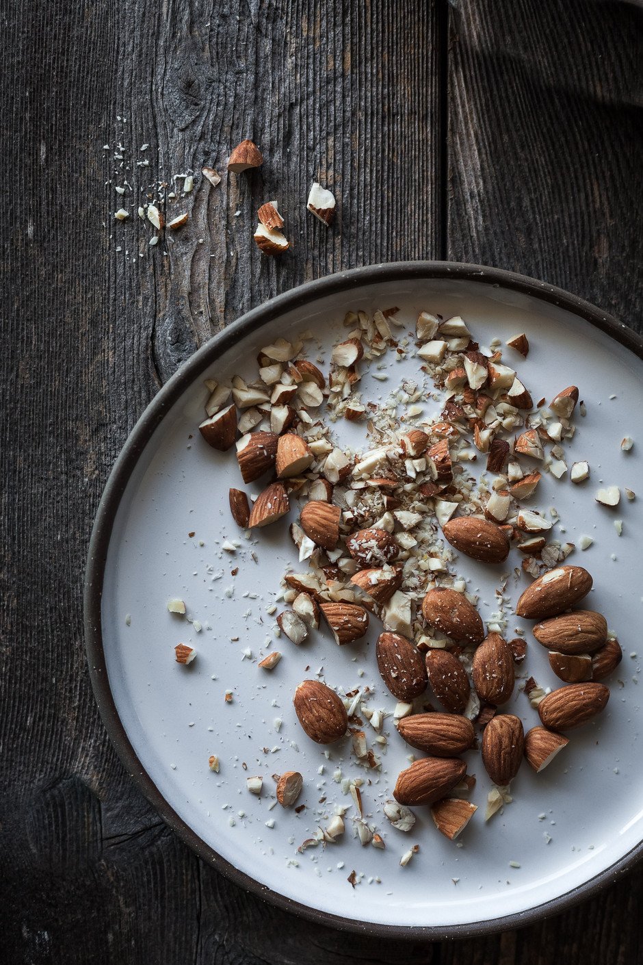 overhead of a plate of chopped almonds.