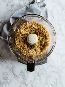 overhead view of blended chickpeas in a food processor.