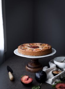 plum cake sitting by open window