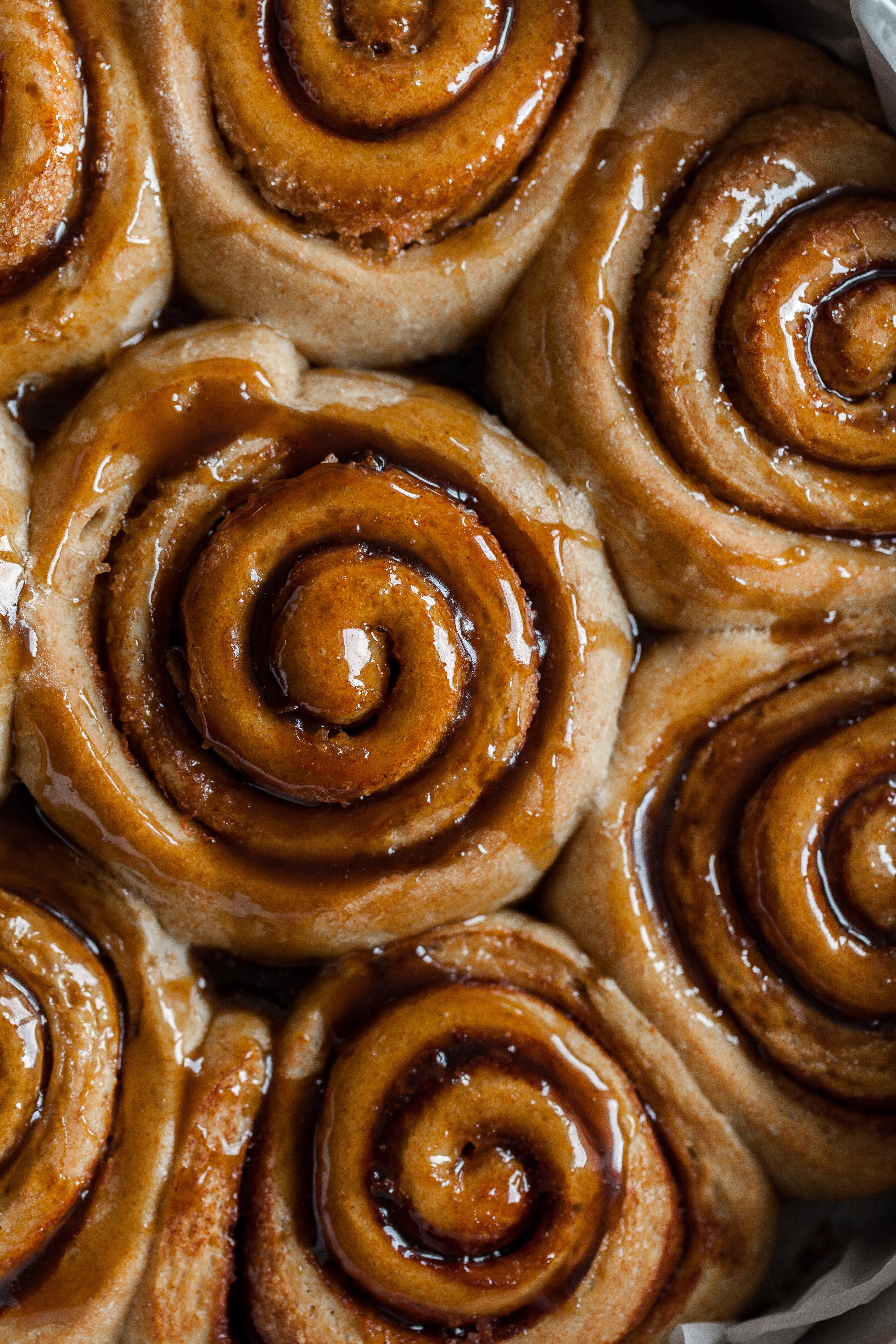 a closeup overhead shot of vegan cinnamon rolls.