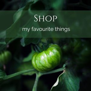 A green tomato with text overlay "shop my favourite things".
